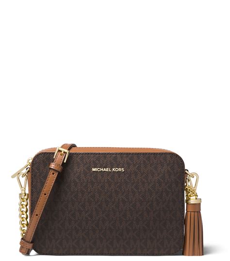 michael kors graphic logo crossbody|Michael Kors Crossbody monogram.